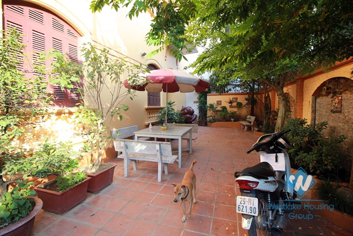 A charming house with large courtyard around for rent in Tay Ho area, Hanoi.